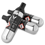 Three Coravin Argon 65 capsules, featuring safety labels and text indicating gas composition and CAS number.