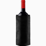 Red wine bottle partially covered by a sleek black wine cooler.