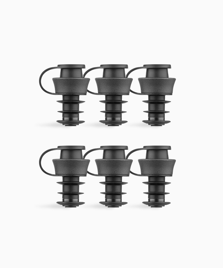 Set of six black rubber stoppers, each featuring a handle and ribbed bottom for secure placement.