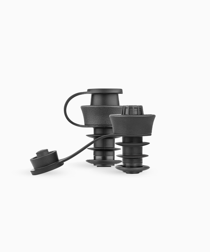 Two black, cylindrical bottle stoppers with pull cords, designed for sealing various containers.