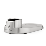 Stainless steel Coravin wine preservation system base with logo, featuring a rubber grip on top for secure placement.
